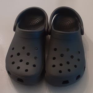 Gray Crocs women 7 or mens 5